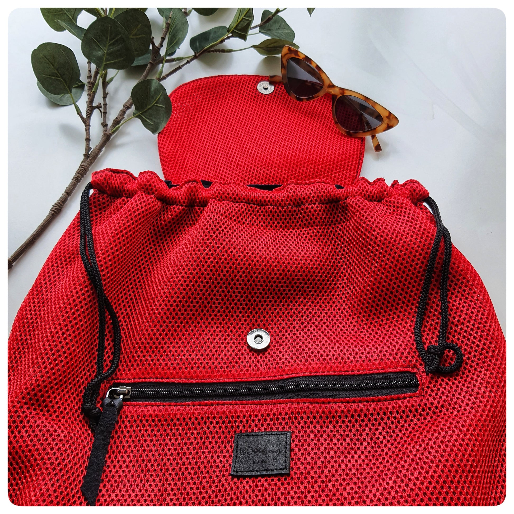 NOMI – Aktif yaşam için ergonomik büzgü kapamalı suya dayanıklı çanta