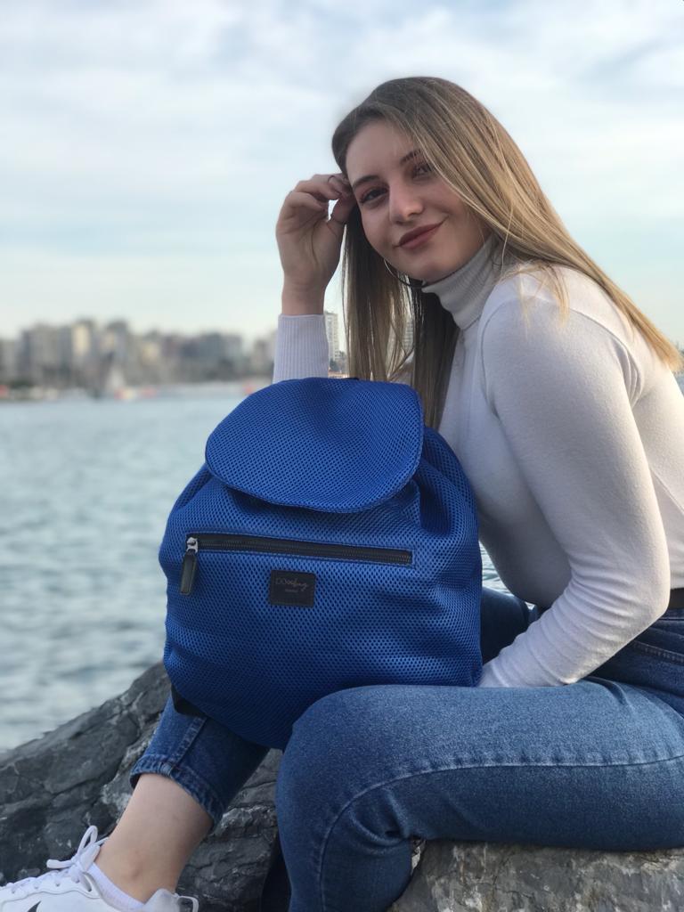 NOMI – Aktif yaşam için ergonomik büzgü kapamalı suya dayanıklı çanta