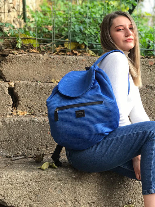 NOMI – Aktif yaşam için ergonomik büzgü kapamalı suya dayanıklı çanta