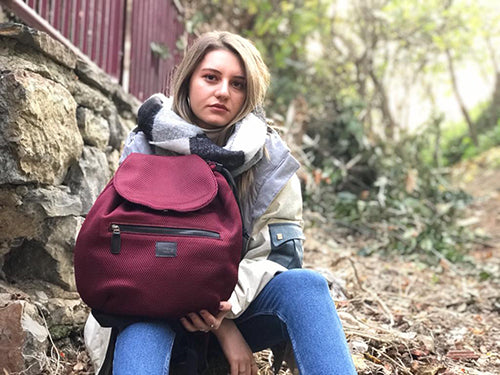 NOMI – Aktif yaşam için ergonomik büzgü kapamalı suya dayanıklı çanta