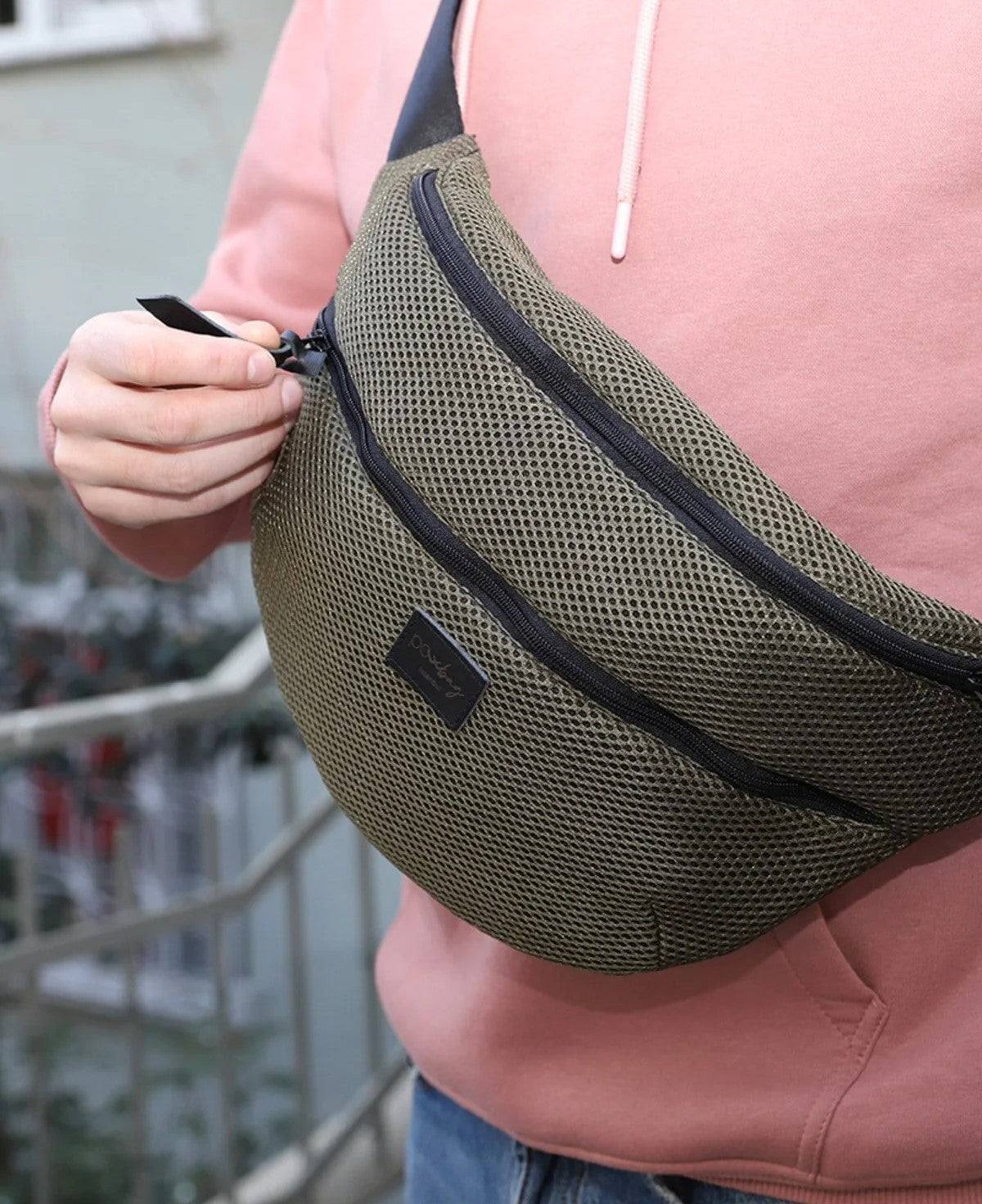 Meshbag file bel çantası, nefes alabilen örgü kumaş, uniseks tasarım, 3 farklı kullanım seçeneğiyle spor, şehir ve seyahat için ideal.
