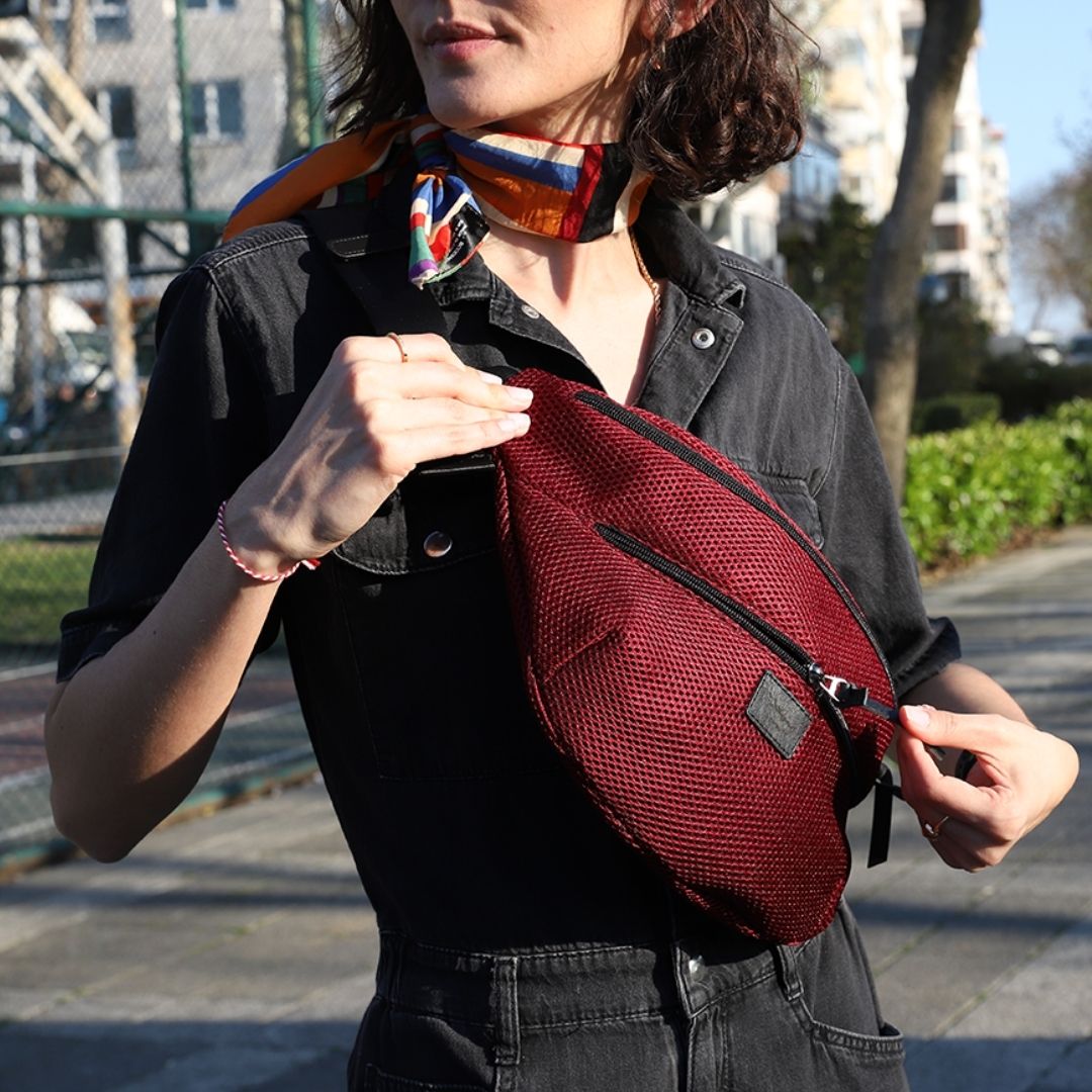 Meshbag file bel çantası, nefes alabilen örgü kumaş, uniseks tasarım, 3 farklı kullanım seçeneğiyle spor, şehir ve seyahat için ideal.